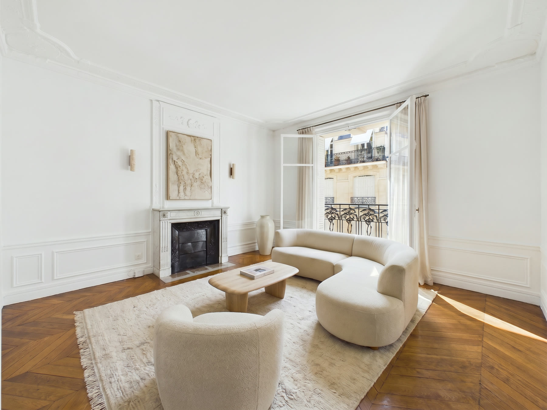 Paris living room virtually re-staged with cream furniture